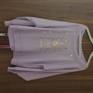 Girls purple blouse with henna hand.